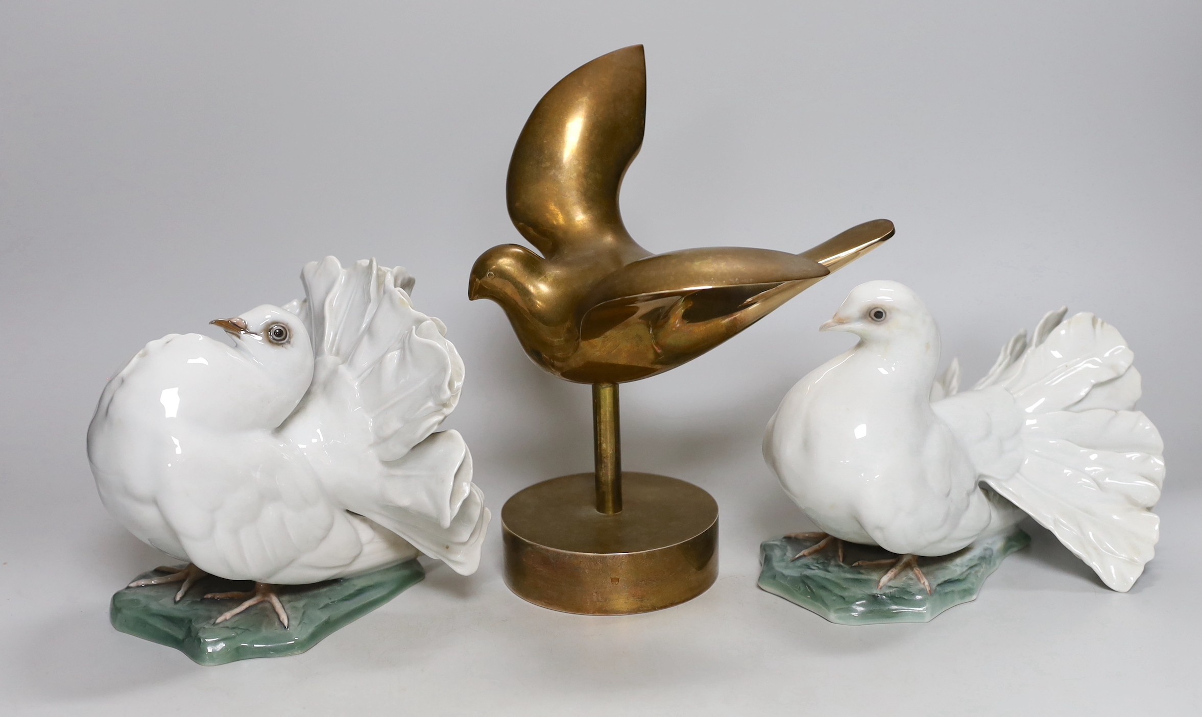 A pair of Rosenthal models of doves and a Swiss bronze dove on stand, bronze dove 23cms high